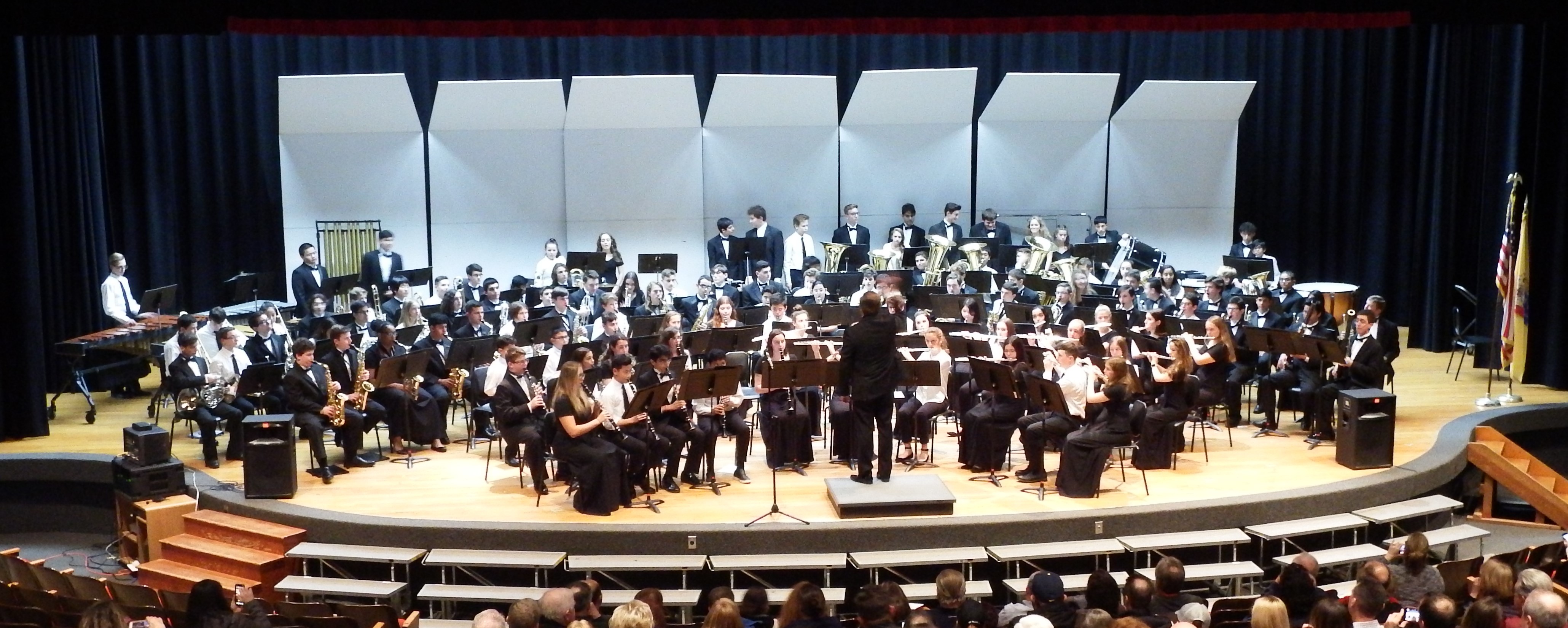 More than 130 musicians filled the stage as 8th Grade Band Students joined the High School musicians for a special combined performance!